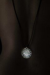 Diamond necklace against black skin
