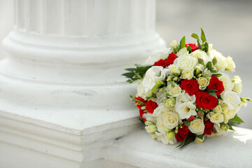 top view of luxury bouquet of red and white flowers top view with red bow on wedding day holiday