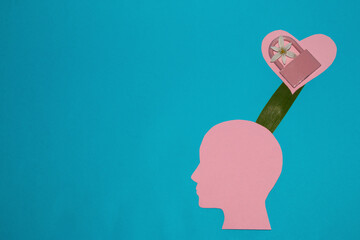 pink paper head with pink heart in pink cloud with padlock and flower, creative summer love concept and copy space