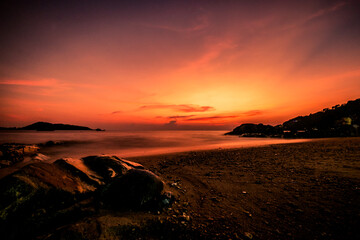 Fototapeta na wymiar Golden time sunset on the beach at Patong Beach ,Phuket ,Thailand