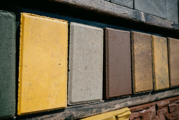Paving slabs of different colors and shapes.Decorative cobblestones are different in color and shape.