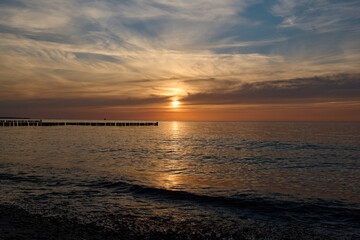 Naklejka na ściany i meble Sunset over the Baltic Sea
