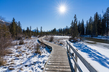 Policeman Creek Riverside Trail, Spring Creek Boardwalk in winter season. Town of Canmore, Alberta, Canada.