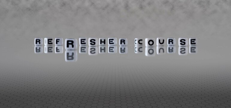refresher course word or concept represented by black and white letter cubes on a grey horizon background stretching to infinity
