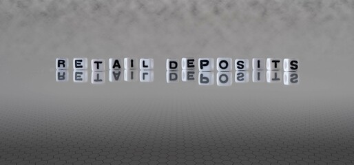 retail deposits word or concept represented by black and white letter cubes on a grey horizon background stretching to infinity