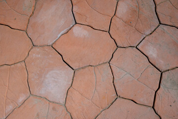 Paving slabs of different colors and shapes.Decorative cobblestones are different in color and shape.