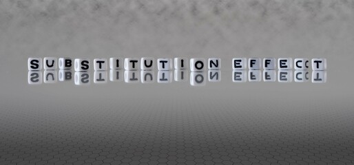 substitution effect word or concept represented by black and white letter cubes on a grey horizon...