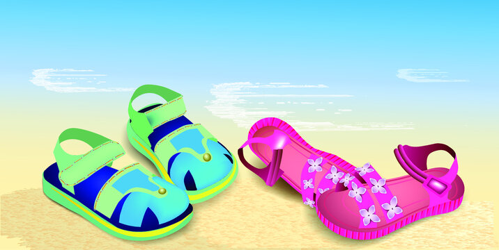 Bright children's sandals on a sandy beach