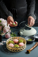 Japanese dessert mochi with matcha green tea powder and cherry,     japanese tea ceremony