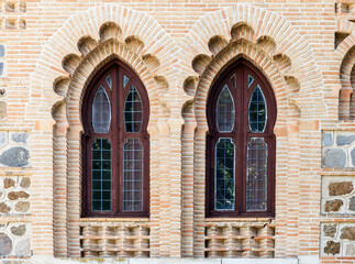Fototapeta na wymiar Ornate windows in moorish style in Toledo railway station