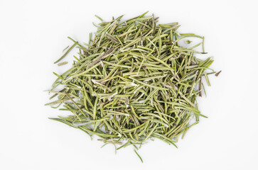 Dried rosemary spice heap on white background.