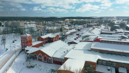 Dobrush, Gomel Region, Belarus. Aerial View Of Old Paper Mill Factory. Bird's-eye View At Snowy Winter Day 4K Skyline Cityscape.