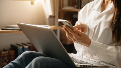  Hand using tablet ,laptop, and holding mobile with credit card online banking payment shopping