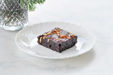 brownie , chocolate cake with almond topping
