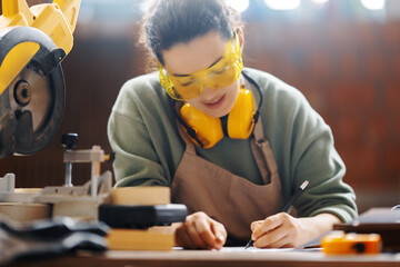 woman carpenter in workshop