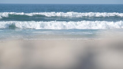 Big blue ocean waves crashing on beach, California pacific coast, USA. Sea water foam and white sand. Summertime shore aesthetic. Surfing vibes, seascape near Los Angeles. Seamless looped cinemagraph.