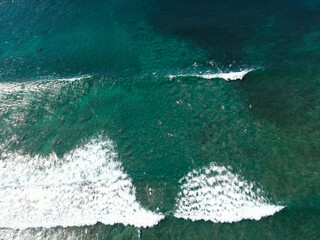 Surfers in the swells in Costa Rica