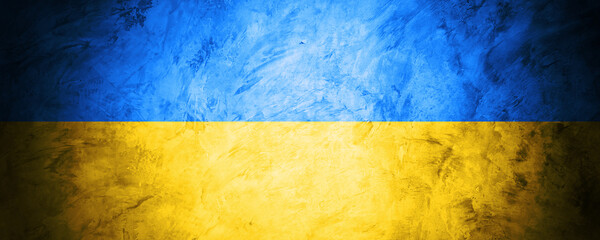 freedom Ukraine flag on dark concreate banner wall background