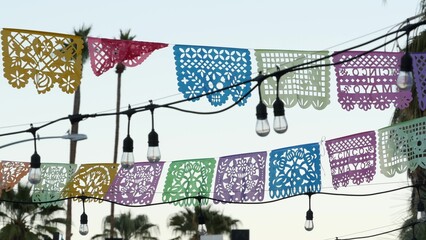 Mexican perforated papel picado banner, festival flags, paper tissue garland. Colorful hispanic...