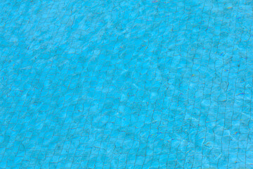 Fototapeta na wymiar The water on swimming pool for background and texture