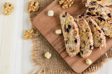 Top view of biscotti on wood plate, home made bakery and healthy food