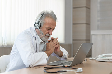 Senior doctor wears headset. Remote online medical chat consultation, tele medicine distance services. Telehealth concept - obrazy, fototapety, plakaty
