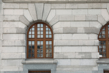 View of beautiful arched windows in building outdoors