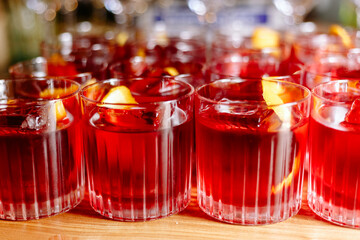 glasses with red alcohol cocktail
