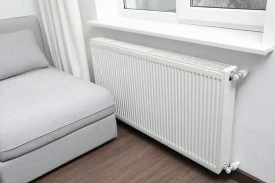 Modern Radiator At Home. Central Heating System