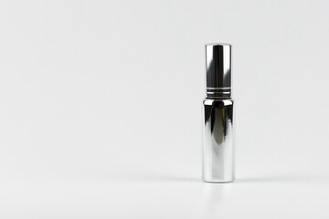metal sprayer of essence perfume minimal style concept. unbranded perfume aluminium sprayer for...