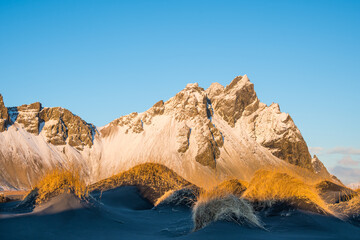 Sunny autumn day at mountain Vestrahorn in Iceland