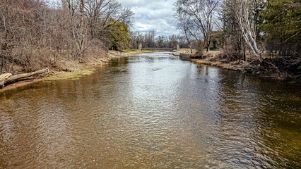 Over the open water during spring with the bridge down the river