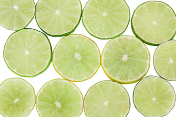 Lime slices isolated on white background, top view