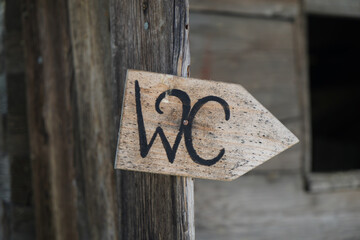 wooden sign on the wall