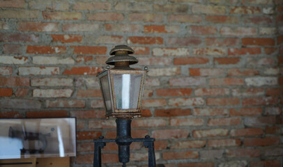 old lamp on brick wall