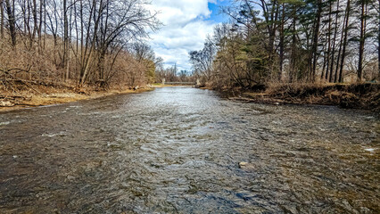 Over the open water during spring with the bridge down the river