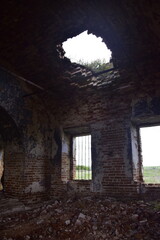 The interior of an old ruined brick church. Ulyanovsk region Russia.