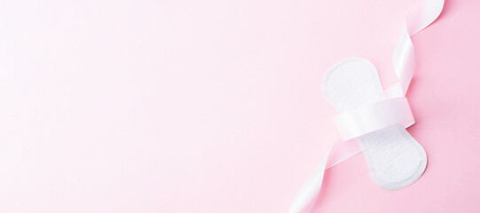 Feminine hygiene menstrual pads. Menstruation napkin for woman hygiene on pink background....