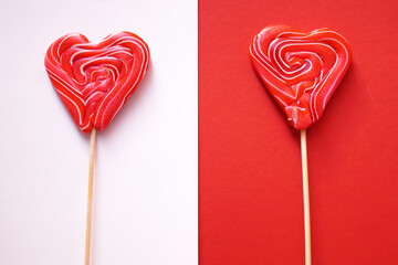 Two heart-shaped lozenges on a red and white background.