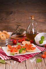 Friselle with cherry tomatoes and basil.