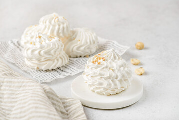 meringue on a wood on white background