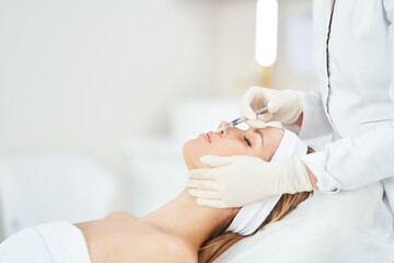 A scene of medical cosmetology treatments botox injection.