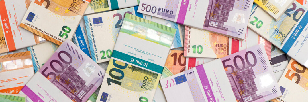 bundles of many Euro currency banknotes