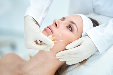 A scene of medical cosmetology treatments botox injection. - obrazy, fototapety, plakaty