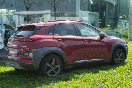 Mulhouse - France - 8 May 2022 -  Rear view of red Hyundai Kona crossover parked in the street