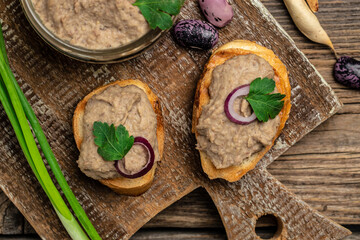 Homemade mushroom and bean paste. Mexican cuisine pate of beans, Pate in glass jar. Tasty sandwich....