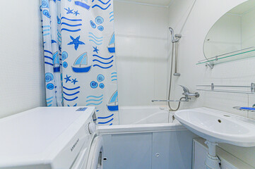 Russia, Moscow- May 21, 2020: interior apartment room bathroom, sink, decorative elements, toilet