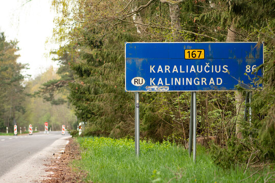 State border between Lithuania and the Russian enclave of Kaliningrad in Russia closed due to sanctions imposed by the European Union with stop sign on the empty road