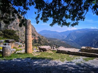 Greek ruins in front of the mountains