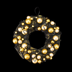 Black coal ring decorated with shoelaces and gold balls as an element of the interior on a black background